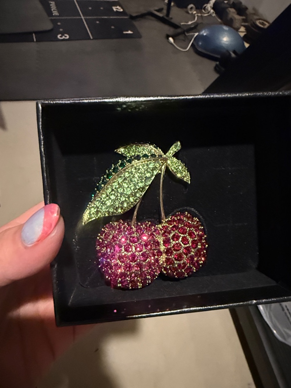 Heidi Daus Cherry on Top Sparkling Cherry Brooch with Green Leaf Accents